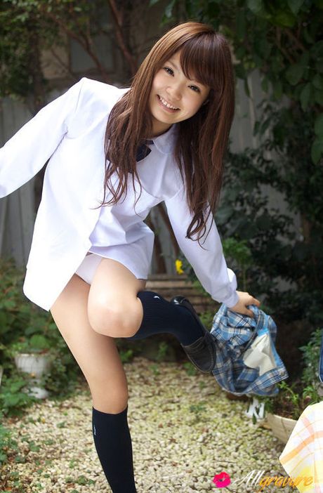 Manami Sato Asian takes school uniform off and shows body outdoor