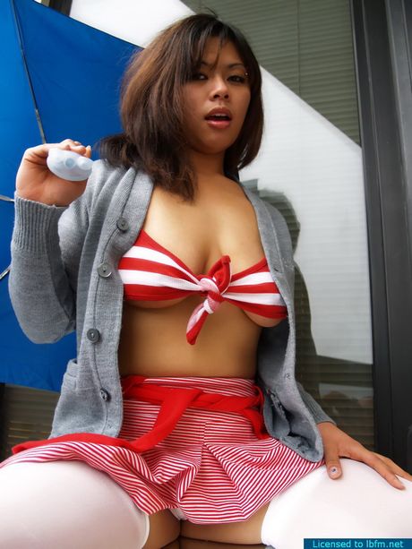 Skinny Asian babe with small tits strips and reveals her hot body