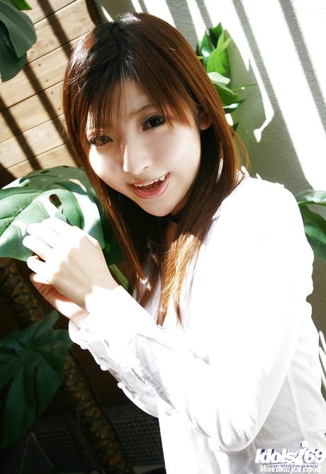 Rangy japanese teen Miyo in skirt exposing small tits and playing with toy